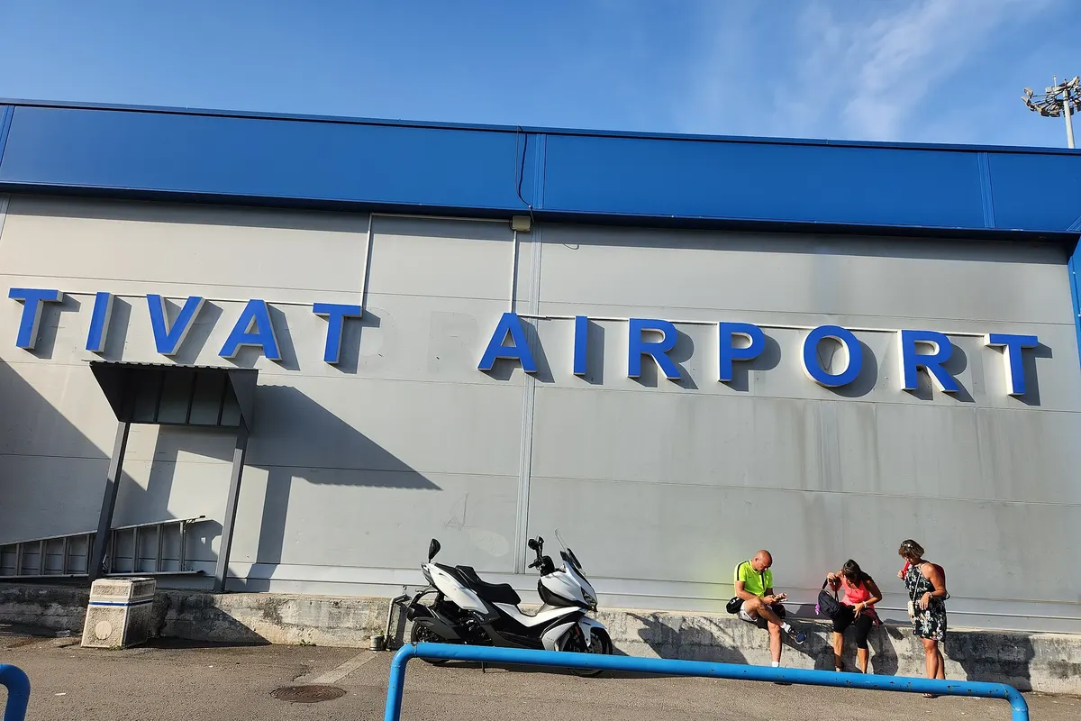 The Tivat Airport sign on the front of the terminal building, the closest airport to Budva.